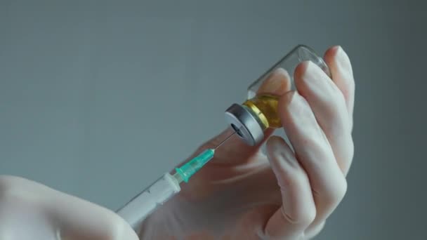 Filling syringe from vial — Stock Video