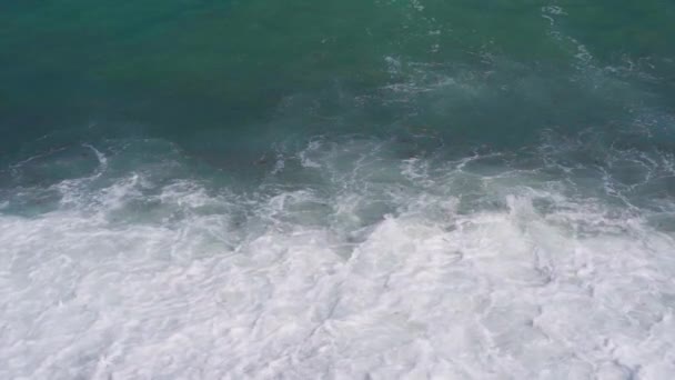 Slow motion waves on pebble sea public beach. — Stock Video