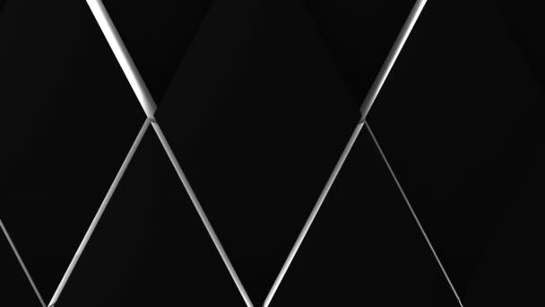 beaucoup de losanges noirs sur la surface de toute l'onde volumétrique de l'écran comme le mouvement des losanges étroitement adjacentes l'une à l'autre au ralenti 