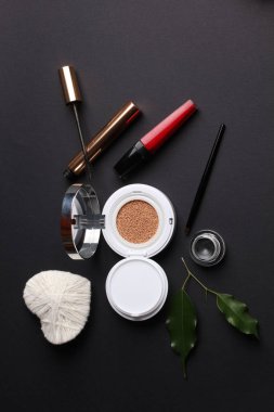 closeup view, cosmetics, makeup and beauty concept on dark background 