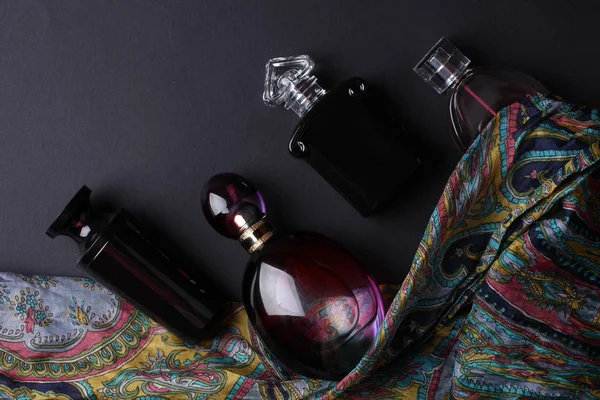 Set Perfumes Clothes Black Background — Stok fotoğraf