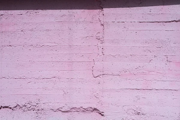 Vieux mur de façade en béton peint avec couleur rose pastel Photos De Stock Libres De Droits