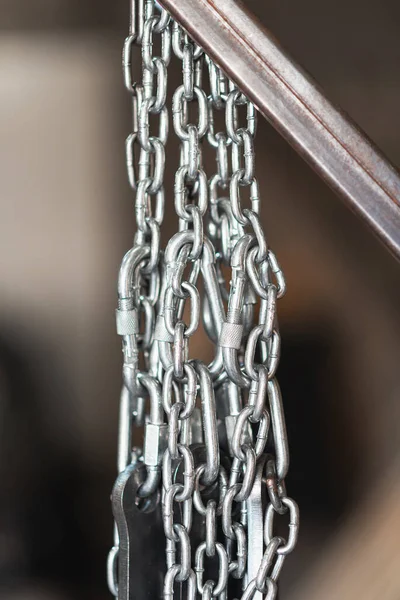 Metal chains in a workshop Royalty Free Stock Photos