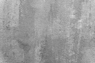 Gelişigüzel boyanmış bir duvarın fotoğrafı.