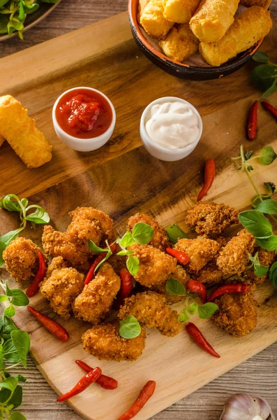 Chicken popcorn with croquettes — Stock Photo, Image