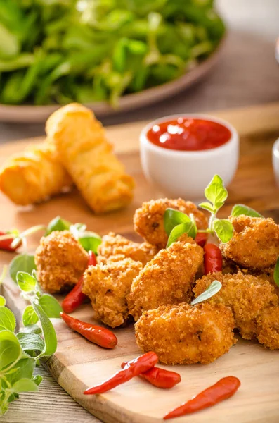 Chicken popcorn with croquettes — Stock Photo, Image