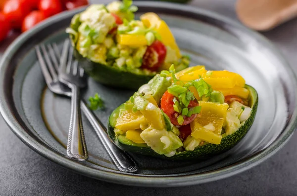 Stuffed avocado with vegetable — Stock Photo, Image