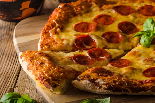 Homemade cheese pizza with salami — Stock Photo, Image