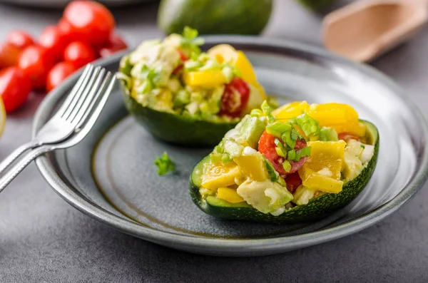 Stuffed avocado with vegetable — Stock Photo, Image