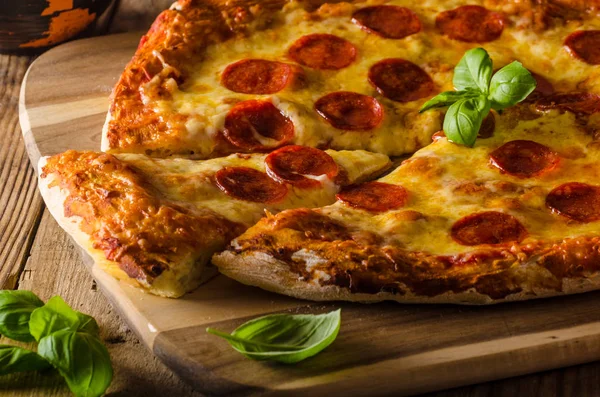 Homemade cheese pizza with salami — Stock Photo, Image