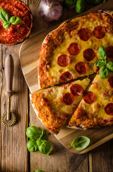 Homemade cheese pizza with salami — Stock Photo, Image