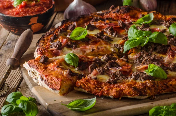 Rustic pizza with minced meat — Stock Photo, Image