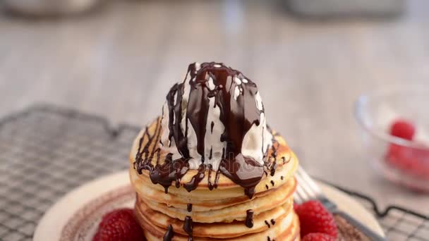 American pancakes with berries, ice cream and chocolate — Stock Video
