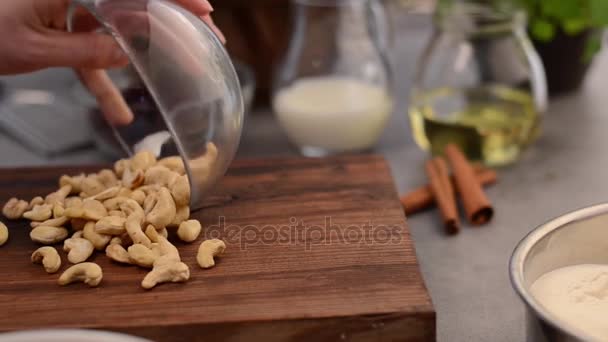 Chopping cashew nuts — Stock Video