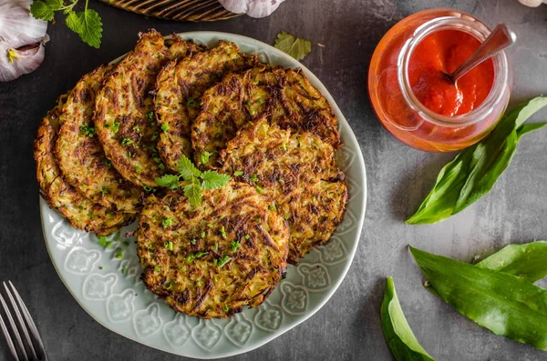 Potato pancakes fried with garlic — Stock Photo, Image