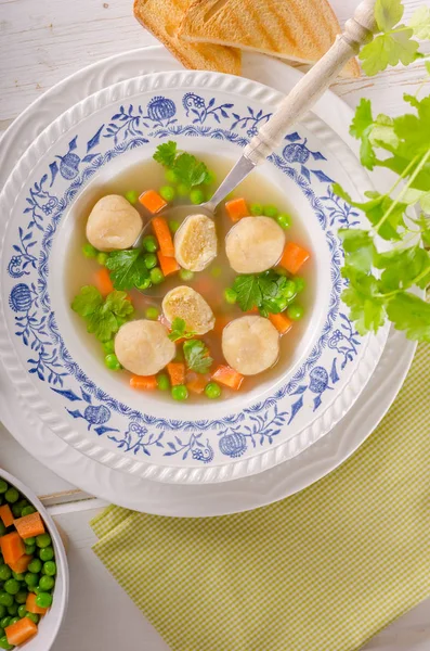 Fresh vegetable soup with chicken dumplings — Stock Photo, Image