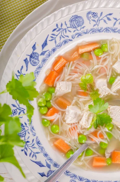 Spring chicken soup noodles, vegetable and toast — Stock Photo, Image