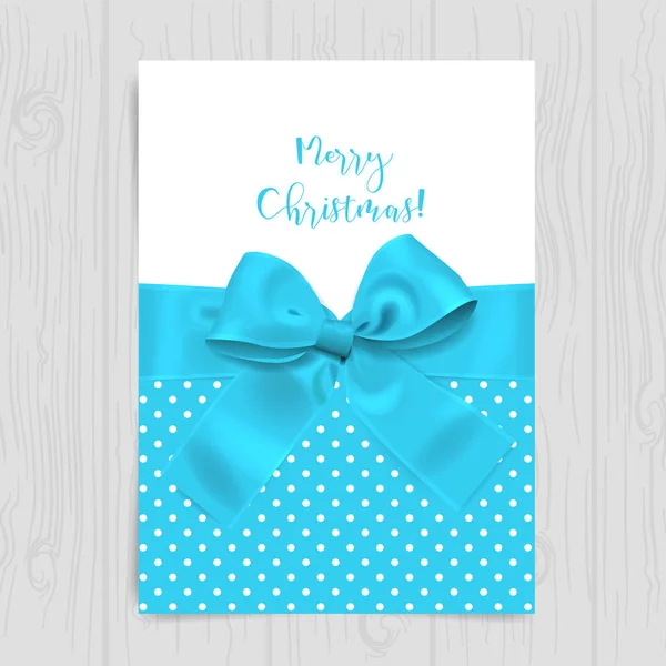Christmas card with blue bow — Stock Vector
