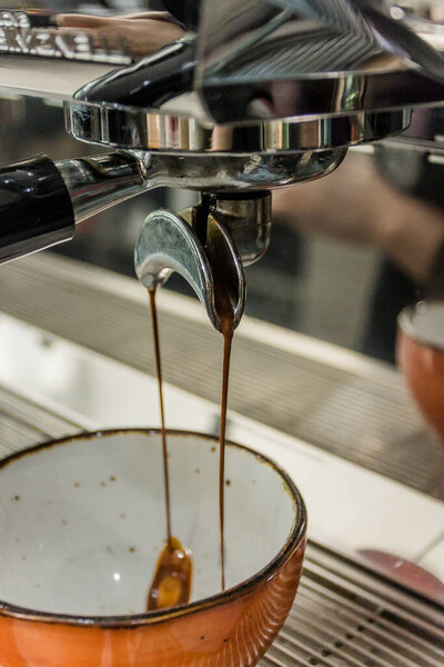 a fascinating process of making coffee. the barista knows a lot about this.