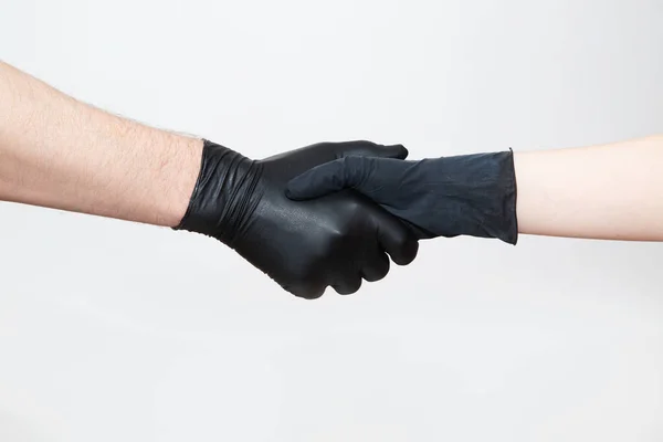 Someone Shakes Hands Black Protective Gloves Protect Germs Bacteria Protect — Stock Photo, Image