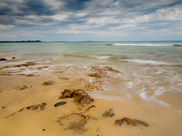 Australische landschap stenen op het strand — Stockfoto