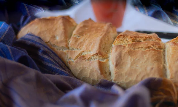 Freshly baked and toasted homemade bread for a healthy Mediterranean meal with tomato oil and salt to make pan-Tumaca