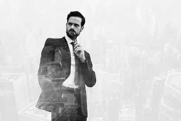 Double exposure with cityscape of business man holding glasses near mouth and looking on something with angry face — Stock Photo, Image