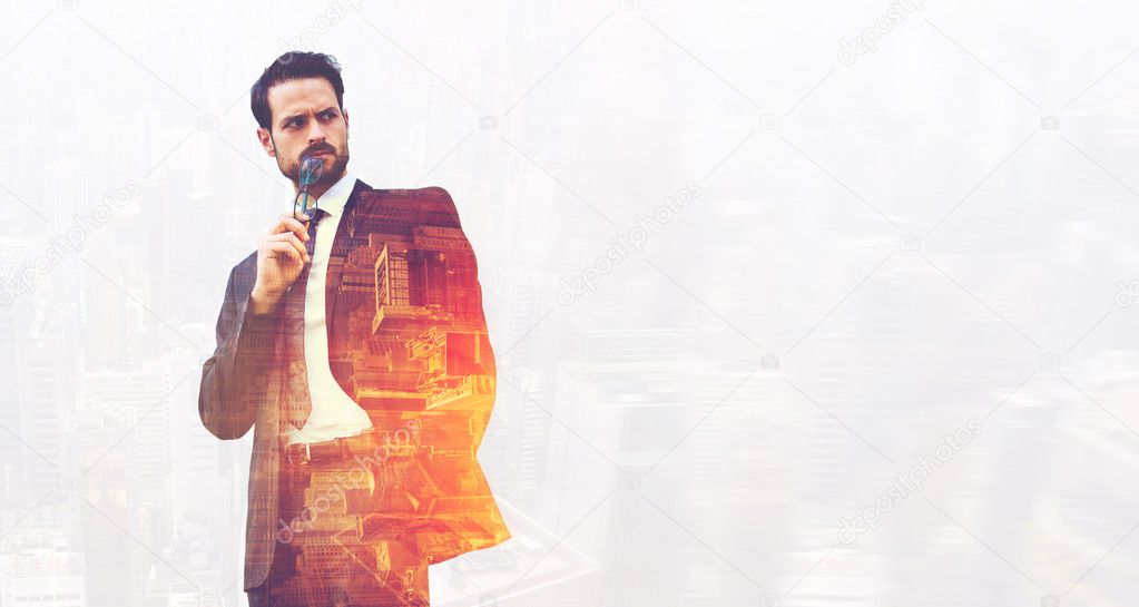 Double exposure of a businessman with angry face is looking away, while is standing near copy space for your advertising text message or promotional content.