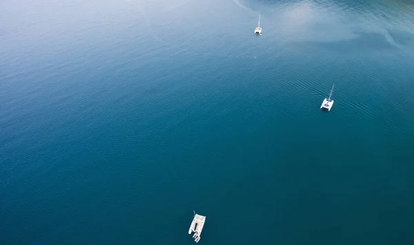 Riding catamarans in open sea — Stock Photo, Image