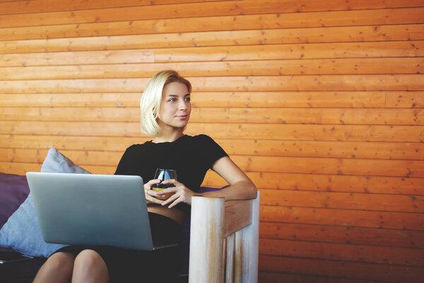 businesswoman sitting with net-book