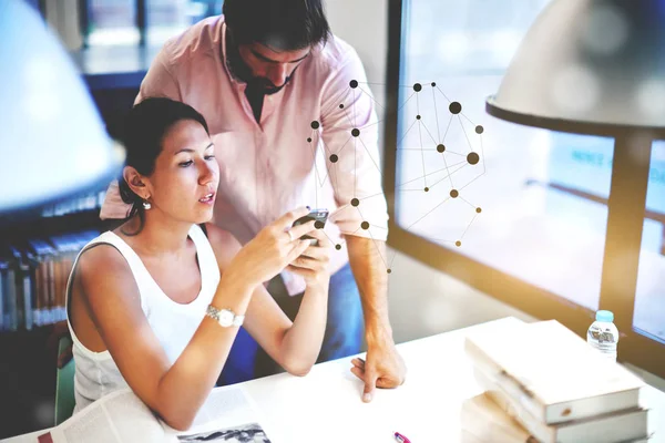 people having conversation while working