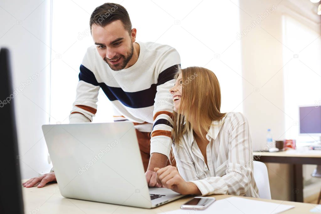 Male and female freelancers analyzing content 