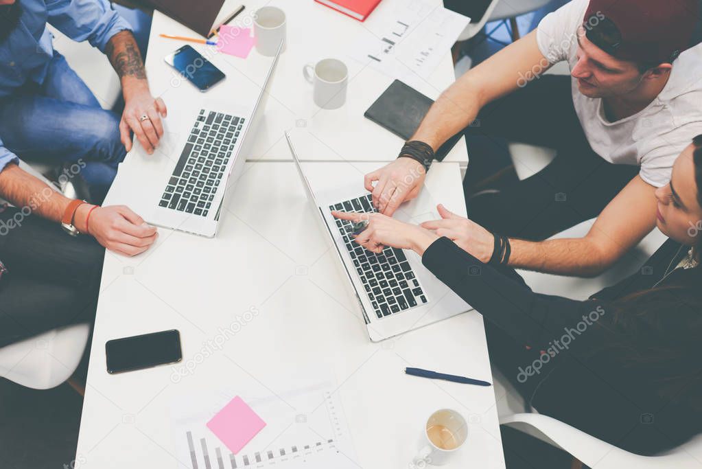  Group of coworkers working at the table