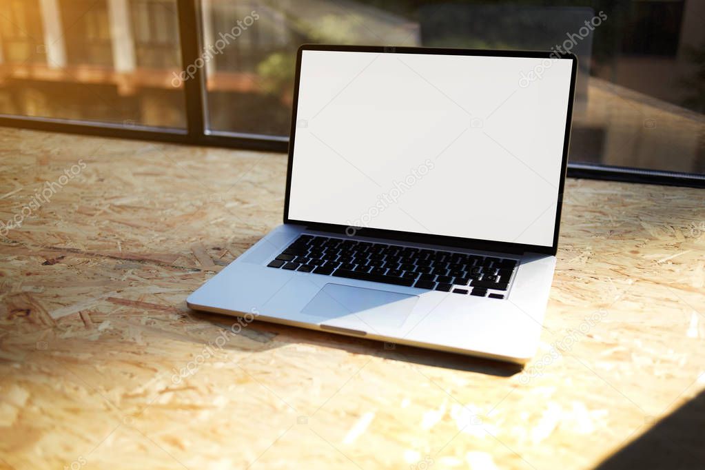 Close up of modern laptop computer on home desktop, downloading testing program software connected to fast 4G interne