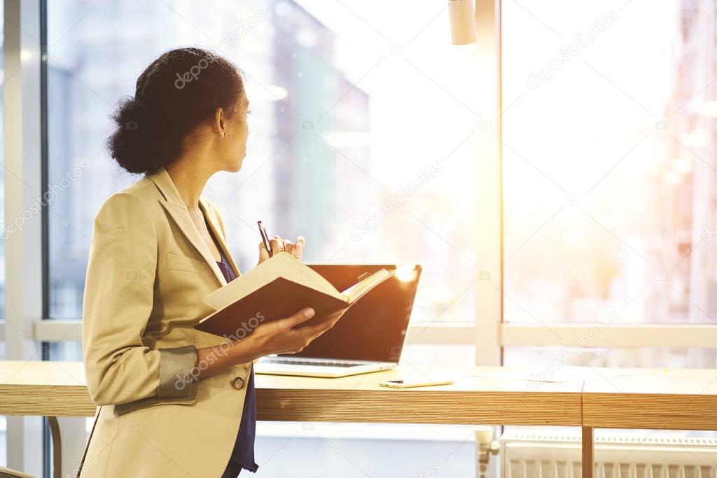 Businesswoman using technology and wifi connection standing near copy space for your advertising