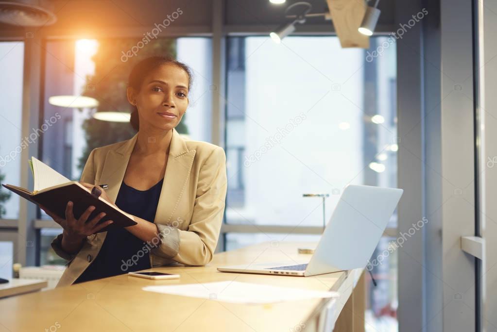 Businesswoman  using laptop computer connected to free wireless network