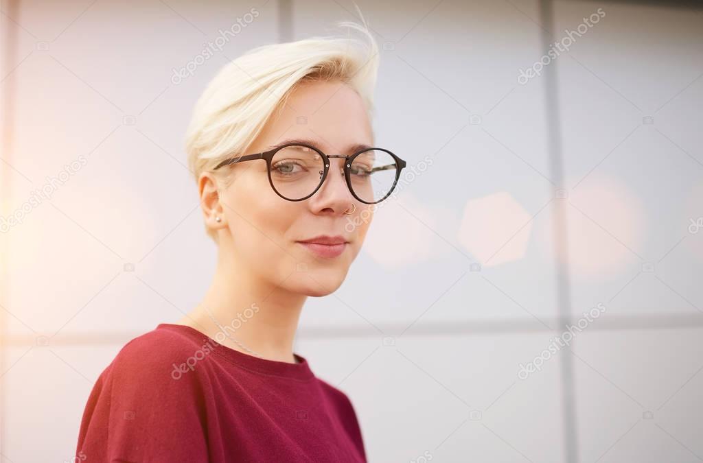 Female hipster in trendy glasses