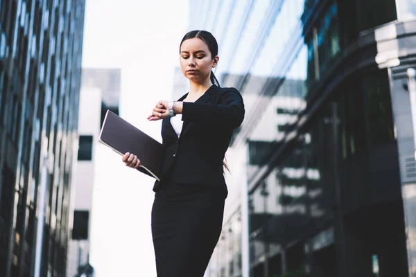 Serious Business Woman Holding Folder Hand Looking Wristwatch Checking Time —  Fotos de Stock