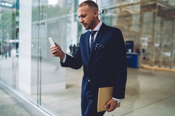 Serious Businessman Elegant Suit Reading Messages Smartphone Sending Feedback While — Stock Photo, Image