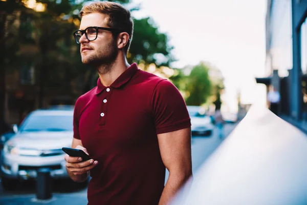 Handsome Bearded Man Optical Eyeglasses Holding Modern Smartphone Hand Looking — Stock Photo, Image