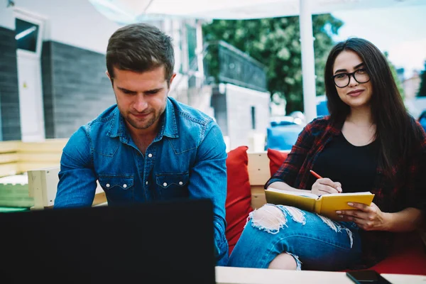 Portrait Skilled Cheerful Female Stylish Eyeglasses Writing Text While Sitting — Stock Photo, Image