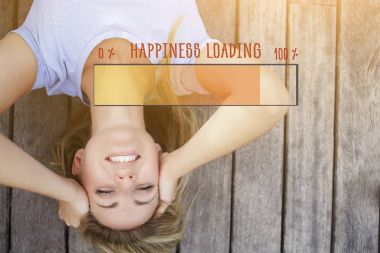 Portrait of young healthy woman with beautiful smile lying on a wooden floor in the fresh air, happy cheerful hipster girl posing for camera. Infographics copy space for your information text message clipart
