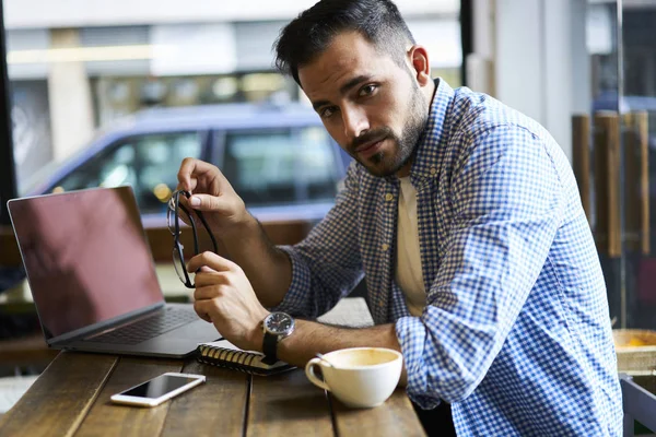 man in cafe close up