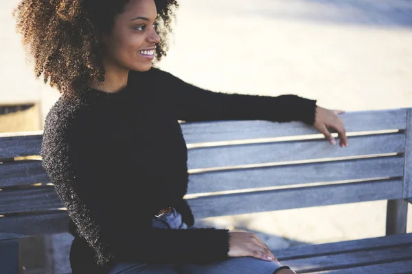 Smiling Attractive Afro American Female Looking Away While Enjoying Leisure — Stock Photo, Image