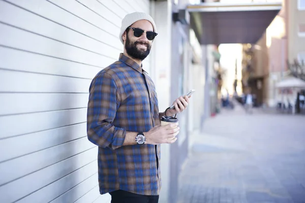 Positive Bearded Hipster Guy Enjoying Weekends Walking Street Using Application — Stock Photo, Image