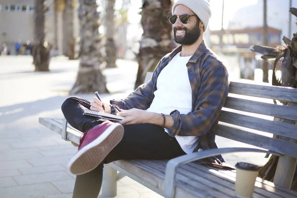 Cheerful Bearded Guy Sunglasses Sitting Bench Spending Free Time Hobby — Stock Photo, Image