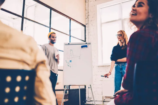 Male Female Colleagues Standing Flip Chart Explaining Common Project Strategy — Stock Photo, Image