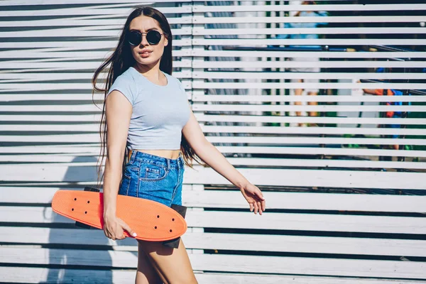 Attractive Young Woman Stylish Black Sunglasses Strolling Skateboard White Promotional — Stock Photo, Image