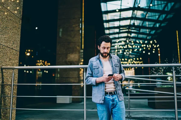 Serious Caucasian Hipster Guy Casual Wear Checking Message Mobile Phone — Stock Photo, Image