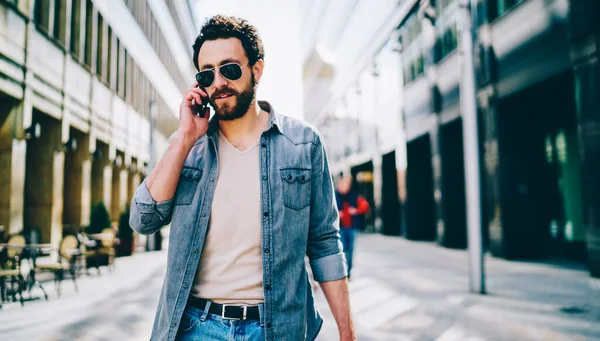 Serious Caucasian Man Trendy Jeans Apparel Sunglasses Walking Outdoors Having — Stock Photo, Image